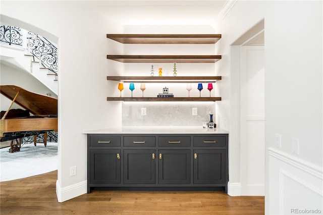 2400 S Columbine St, Denver, CO 80210 - indoor dry bar with light wood-type flooring, stairs, and baseboards