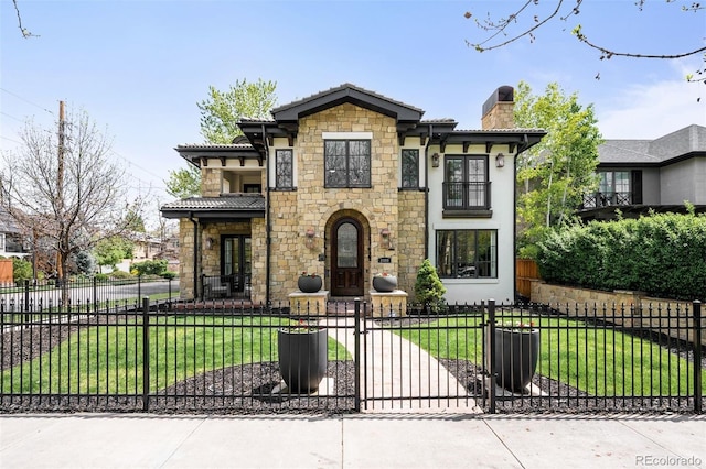 2400 S Columbine St, Denver, CO 80210 - view of front of property featuring stone siding, a chimney, and a gate