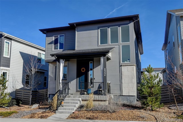 modern home featuring a porch