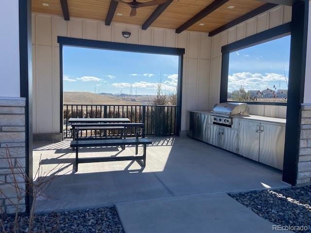 view of patio / terrace featuring ceiling fan, a grill, outdoor dining area, and area for grilling