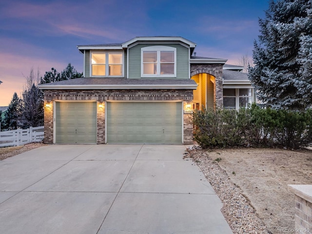 front facade with a garage