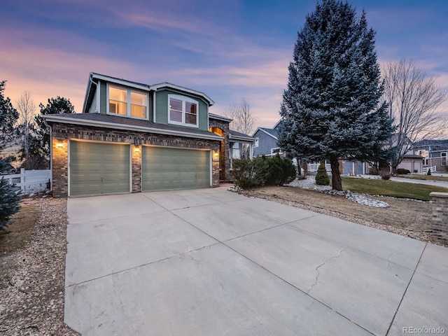 front of property with a garage