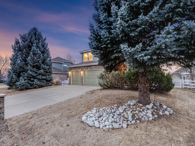 view of front of home with a garage