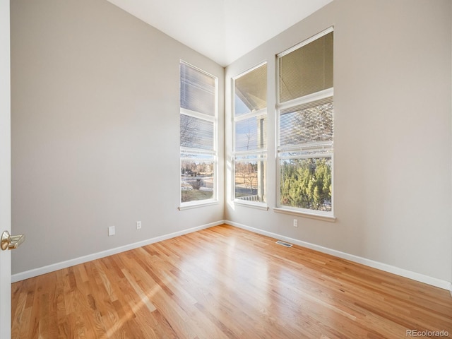 unfurnished room featuring light wood-type flooring