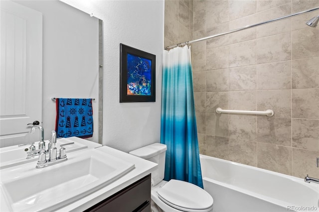 full bathroom featuring vanity, shower / tub combo, and toilet