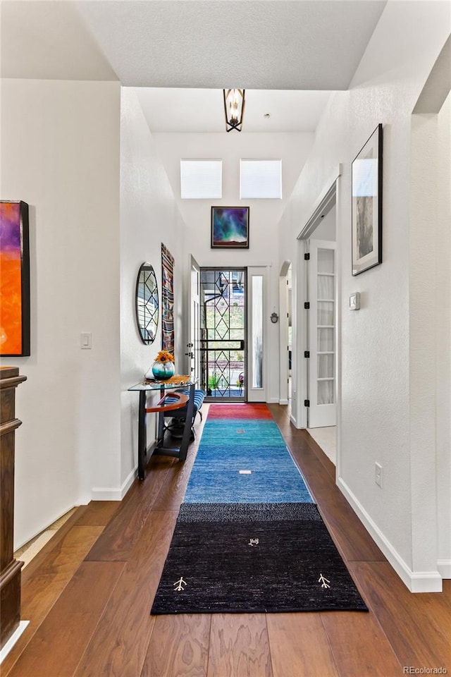 foyer entrance featuring dark hardwood / wood-style floors