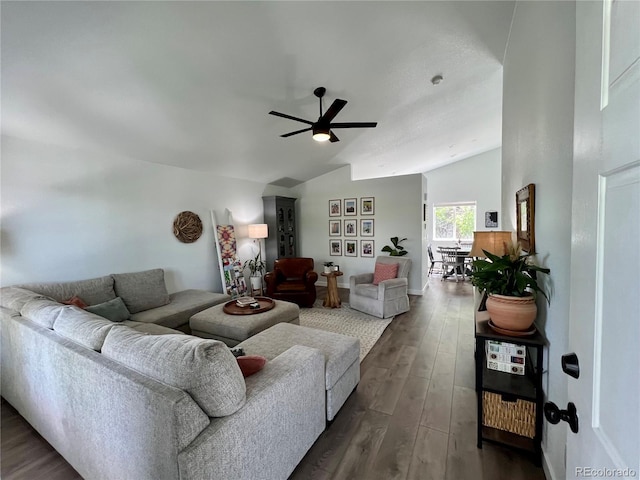 4178 E 94th Pl, Thornton, CO 80229 - living area featuring lofted ceiling, dark wood-type flooring, a ceiling fan, and baseboards
