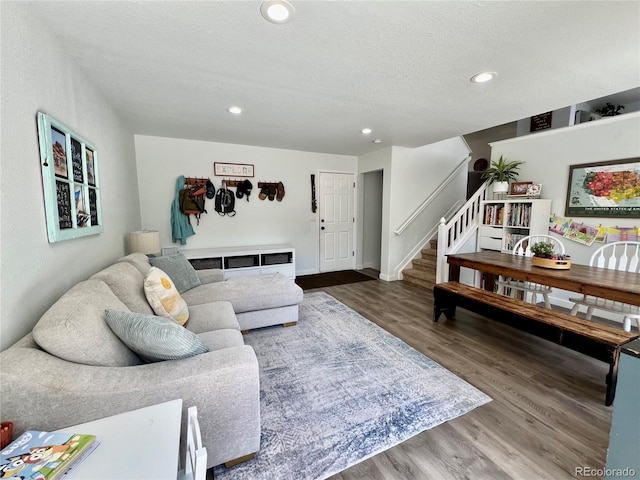 4178 E 94th Pl, Thornton, CO 80229 - living room with stairway, wood finished floors, and recessed lighting