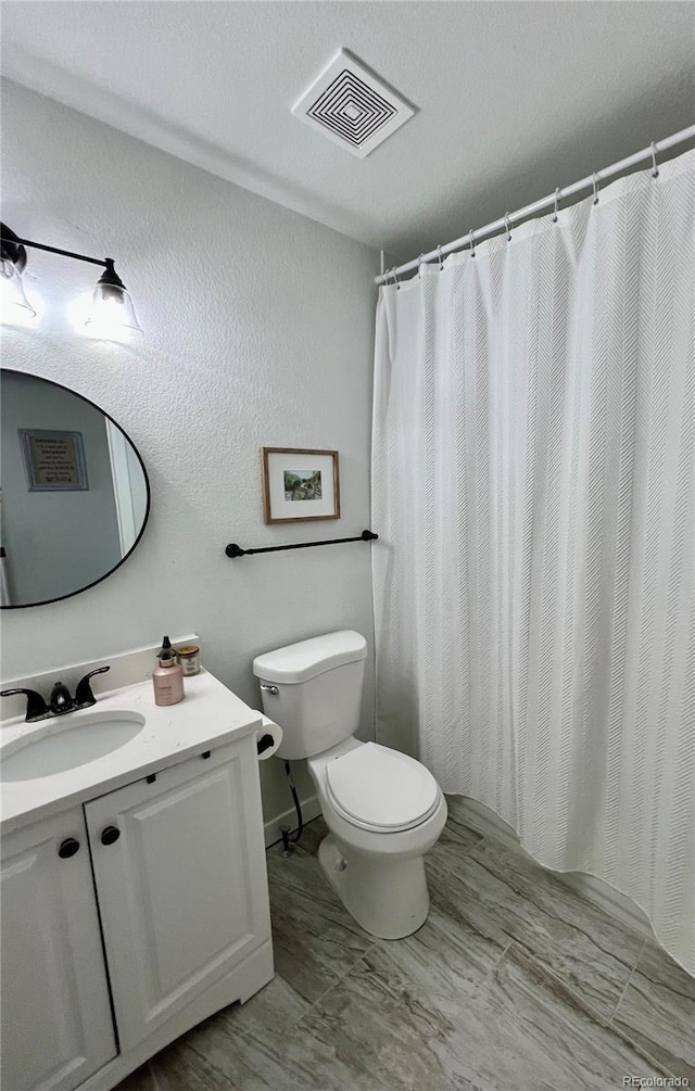 4178 E 94th Pl, Thornton, CO 80229 - full bathroom featuring toilet, vanity, and a shower with curtain