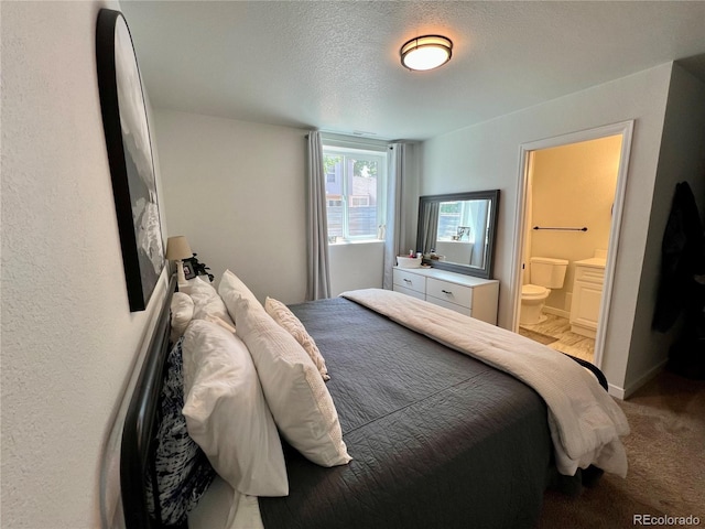 4178 E 94th Pl, Thornton, CO 80229 - bedroom featuring carpet flooring, ensuite bathroom, and a textured ceiling