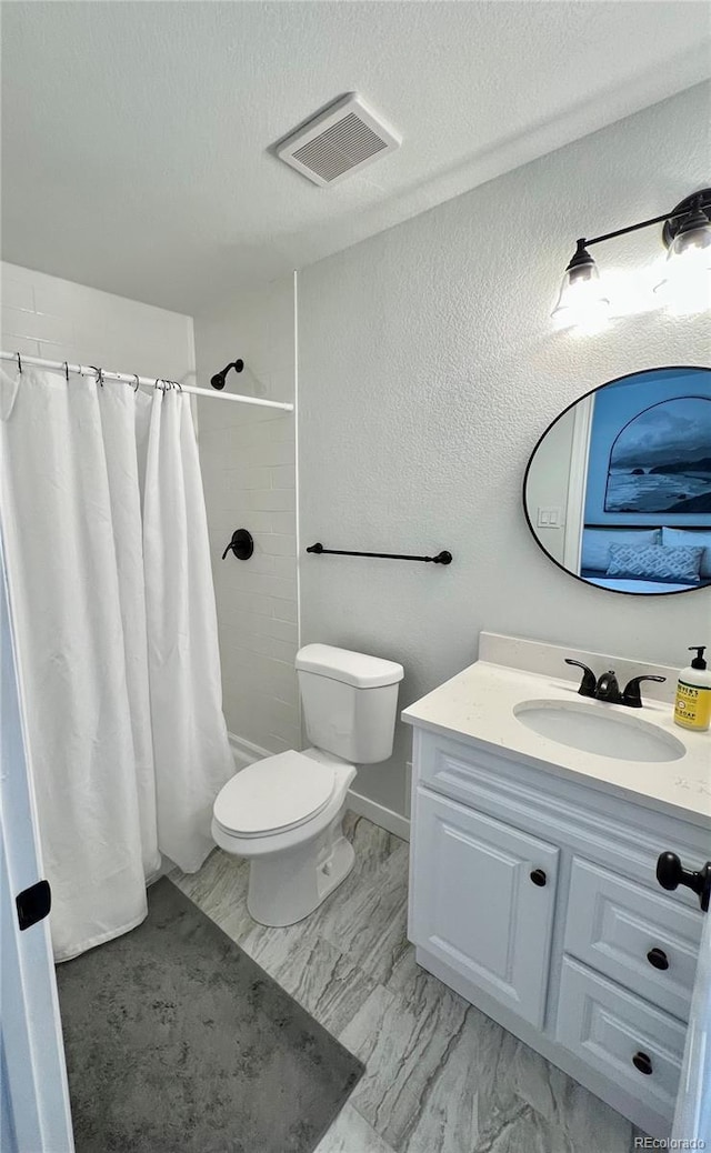 4178 E 94th Pl, Thornton, CO 80229 - bathroom with toilet, vanity, curtained shower, and a textured ceiling