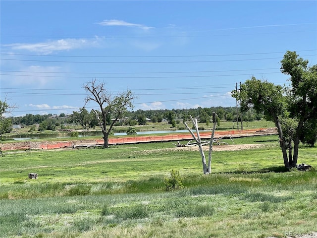 4178 E 94th Pl, Thornton, CO 80229 - view of grassy yard featuring a water view