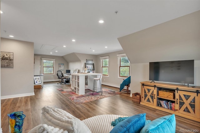 living area featuring baseboards, wood finished floors, recessed lighting, an office area, and attic access