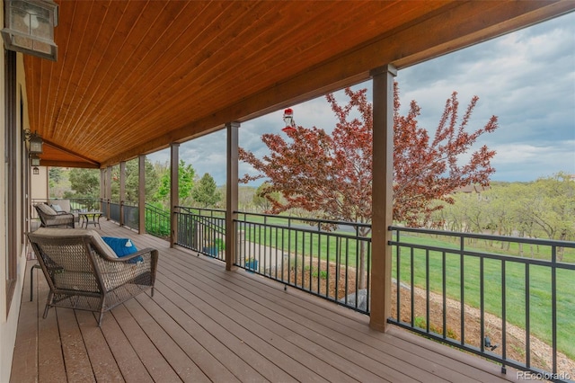 deck featuring a yard