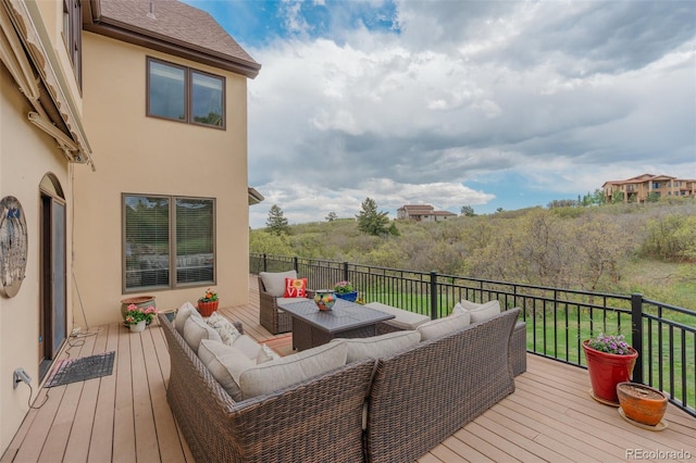 wooden deck with outdoor lounge area