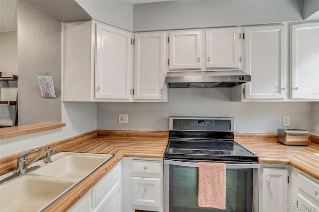 1068 Milo Cir Unit A, Lafayette, CO 80026 - kitchen with stainless steel range with electric stovetop, under cabinet range hood, and white cabinets