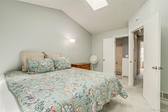 1068 Milo Cir Unit A, Lafayette, CO 80026 - bedroom with vaulted ceiling, light colored carpet, and a skylight