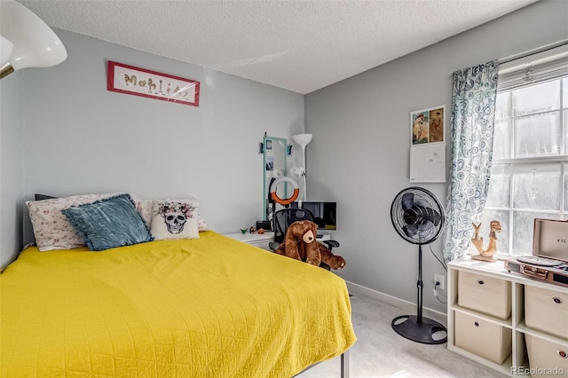 1068 Milo Cir Unit A, Lafayette, CO 80026 - bedroom featuring carpet floors and a textured ceiling