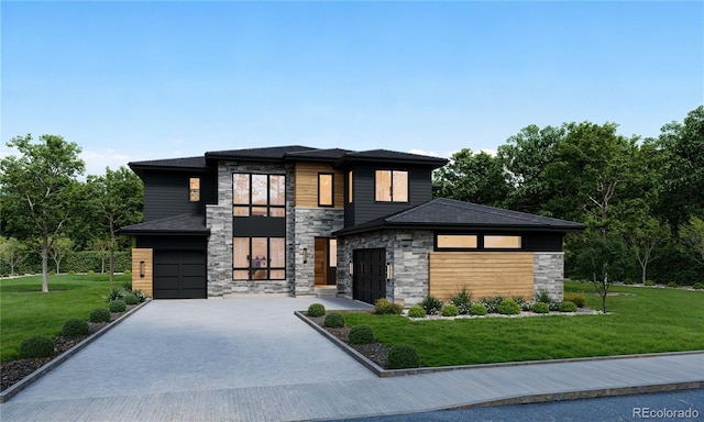 view of front of home with a garage and a front lawn