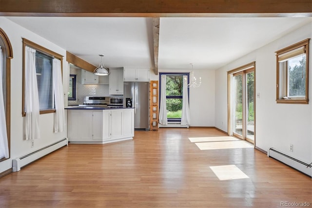 5939 S Skyline Dr, Evergreen, CO 80439 - kitchen featuring appliances with stainless steel finishes, baseboard heating, light wood-style floors, a chandelier, and beamed ceiling