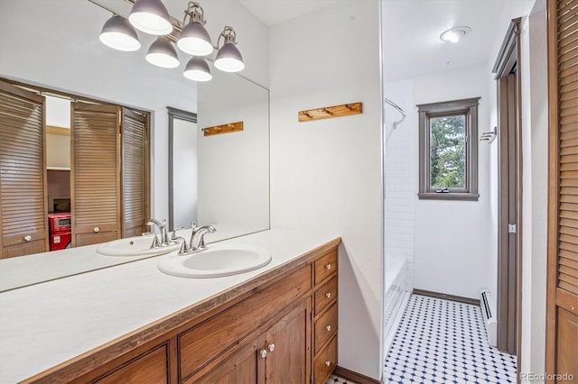 5939 S Skyline Dr, Evergreen, CO 80439 - full bath featuring a closet, vanity, bathtub / shower combination, and tile patterned floors