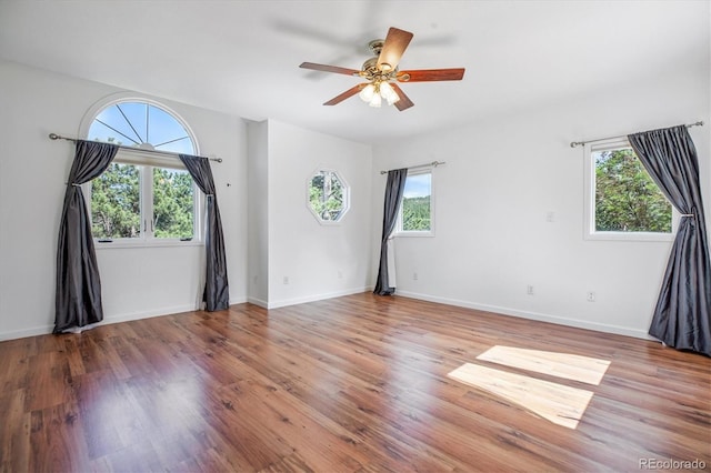 5939 S Skyline Dr, Evergreen, CO 80439 - spare room with ceiling fan and wood finished floors
