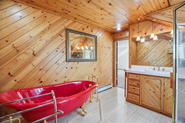 5939 S Skyline Dr, Evergreen, CO 80439 - full bathroom with a freestanding tub, a baseboard radiator, vanity, wood ceiling, and vaulted ceiling