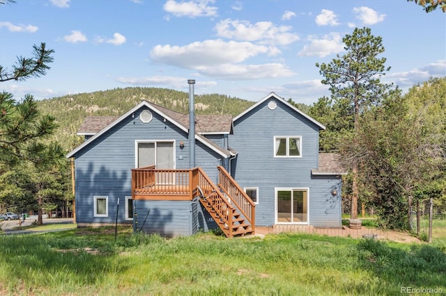5939 S Skyline Dr, Evergreen, CO 80439 - rear view of property with stairs and roof with shingles