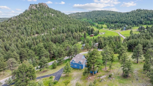 5939 S Skyline Dr, Evergreen, CO 80439 - view of subject property featuring a heavily wooded area