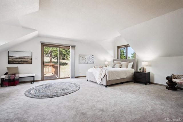 5939 S Skyline Dr, Evergreen, CO 80439 - bedroom with carpet, access to exterior, and vaulted ceiling
