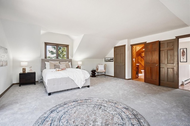 5939 S Skyline Dr, Evergreen, CO 80439 - bedroom featuring light carpet, a baseboard radiator, and vaulted ceiling