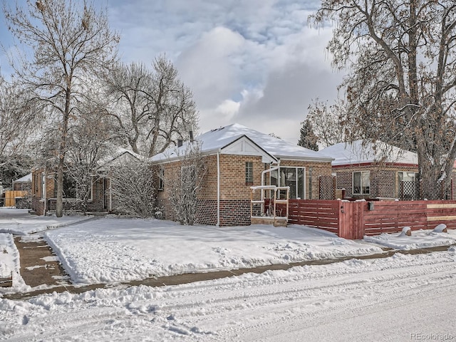 view of snow covered property