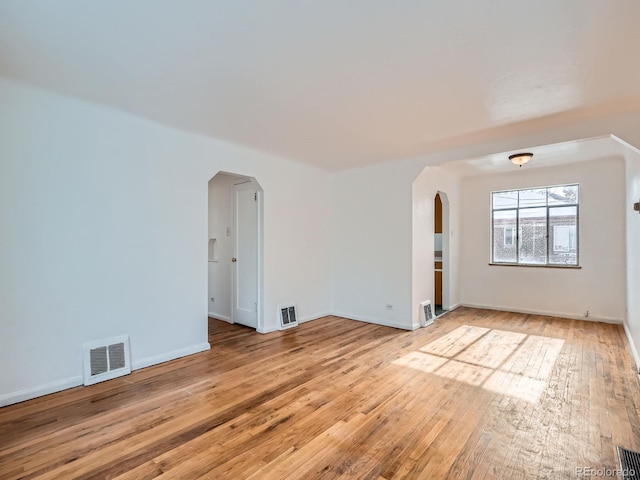 unfurnished room featuring light hardwood / wood-style floors