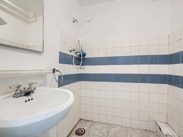 bathroom with a shower and sink