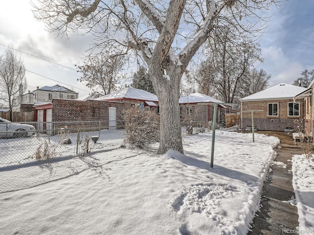 view of snowy yard