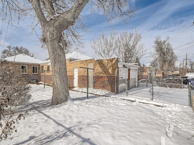 view of yard covered in snow