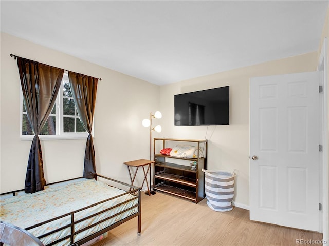 194 Tincup Ter, Bailey, CO 80421 - bedroom featuring wood finished floors and baseboards