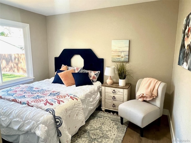 bedroom with wood-type flooring