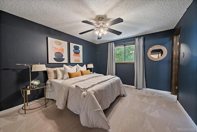2130 Squires St, Longmont, CO 80501 - bedroom with carpet floors, ceiling fan, and a textured ceiling