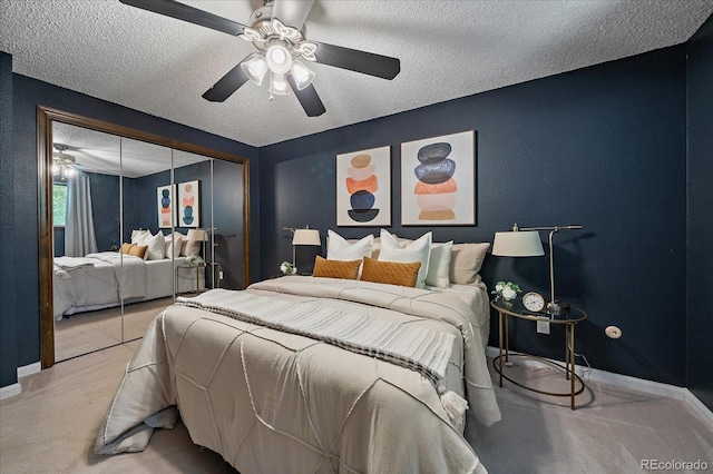 2130 Squires St, Longmont, CO 80501 - carpeted bedroom featuring a closet, a textured ceiling, and ceiling fan