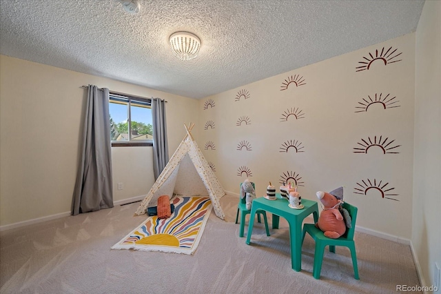 2130 Squires St, Longmont, CO 80501 - game room with carpet flooring and a textured ceiling