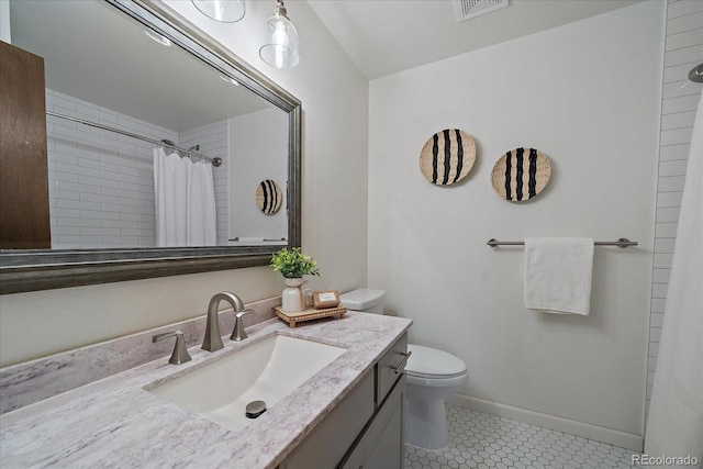 2130 Squires St, Longmont, CO 80501 - full bathroom featuring vanity, a shower with curtain, and tile patterned flooring