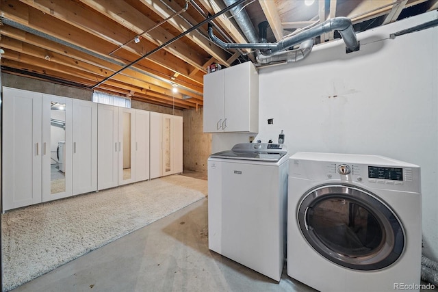 2130 Squires St, Longmont, CO 80501 - washroom featuring cabinet space and washing machine and dryer