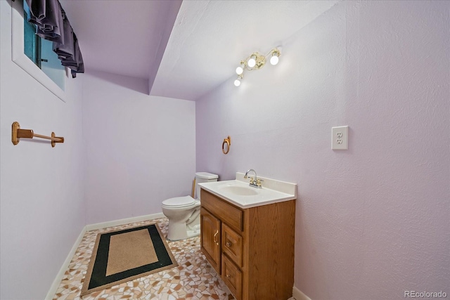 2130 Squires St, Longmont, CO 80501 - half bath featuring toilet and vanity