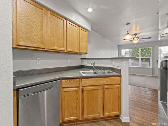23500 E Alamo Pl Unit C, Aurora, CO 80016 - kitchen featuring stainless steel dishwasher, ceiling fan, wood finished floors, and dark countertops