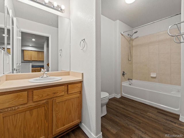 23500 E Alamo Pl Unit C, Aurora, CO 80016 - bathroom with tub / shower combination, wood finished floors, and vanity