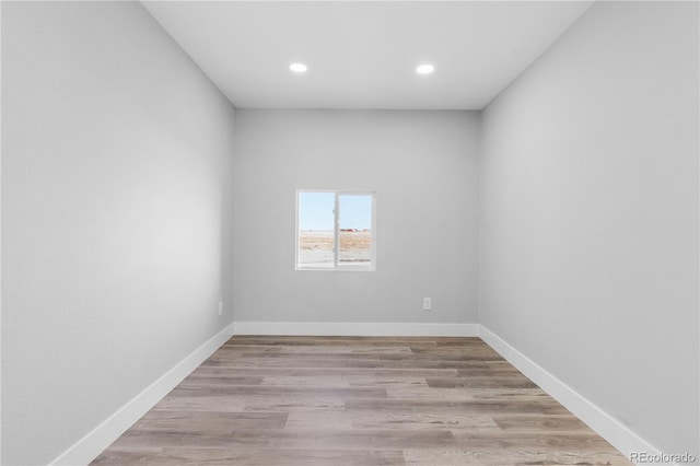 unfurnished room featuring light wood-type flooring