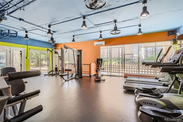 workout area with a wall mounted AC