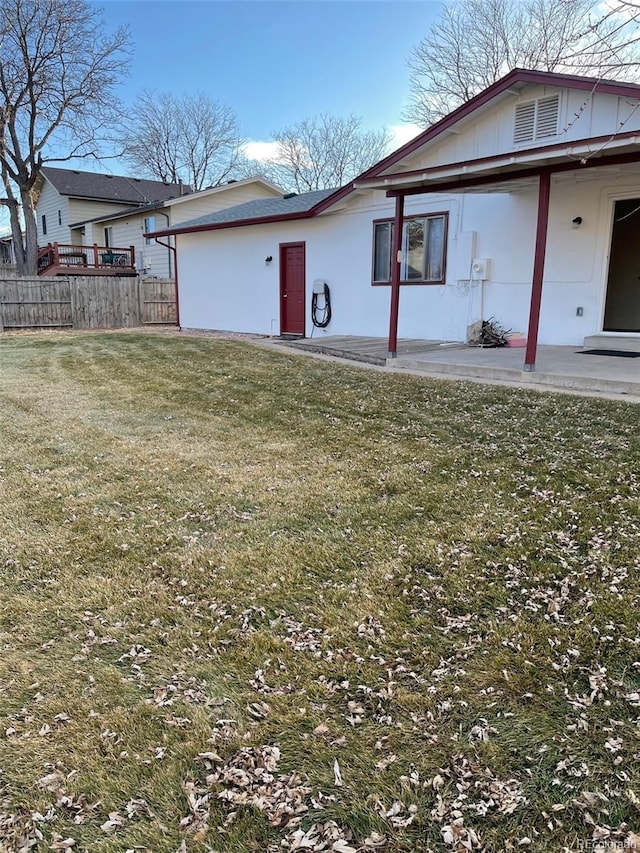 exterior space featuring a yard and a patio area