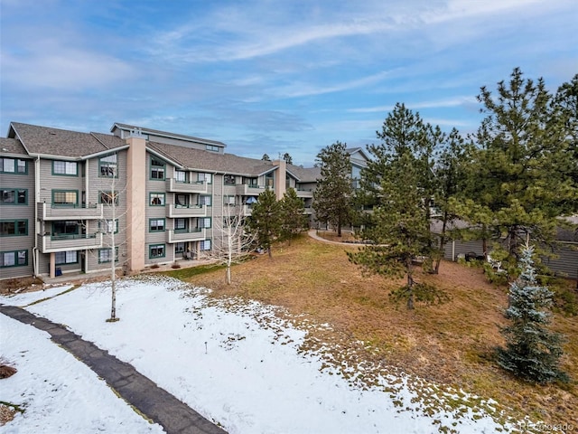 view of snow covered property